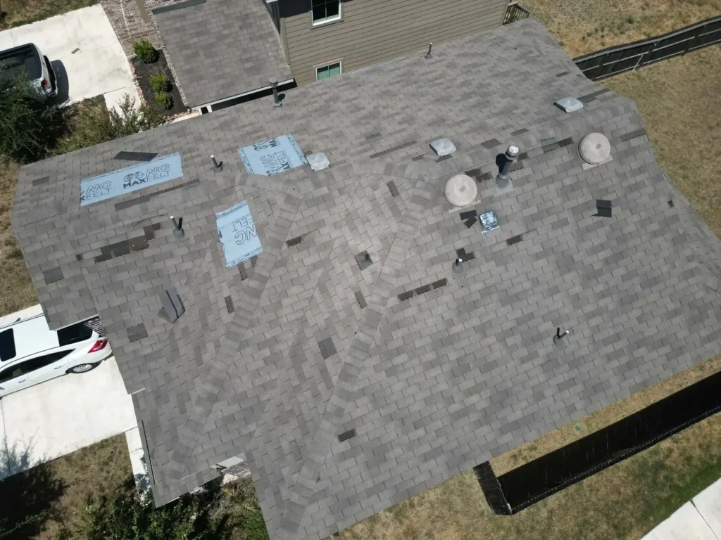 Aerial view of shingle roof during roofing evaluation