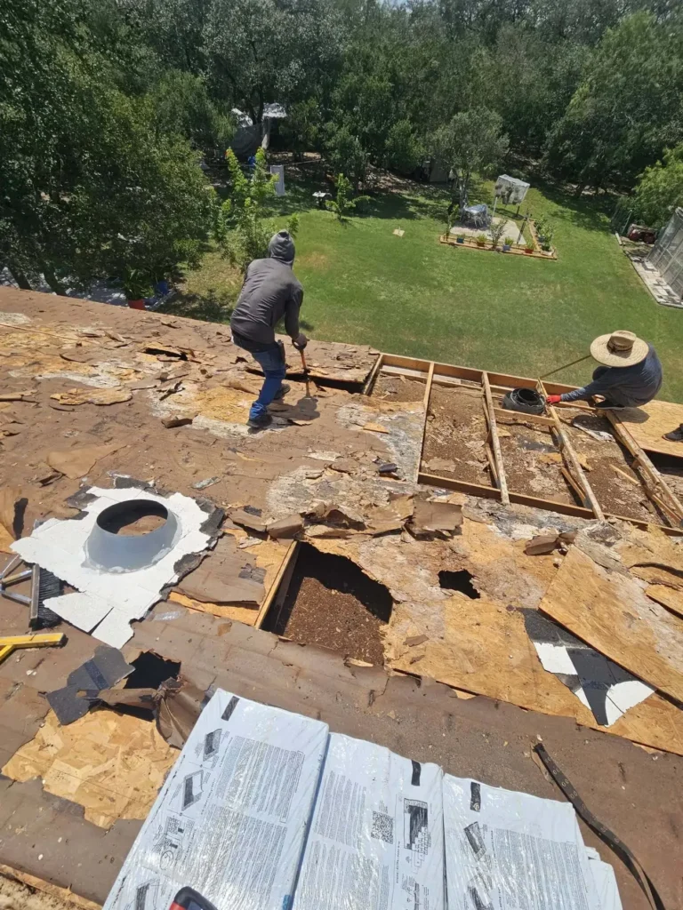 Roof deck repair during leak-related roofing work