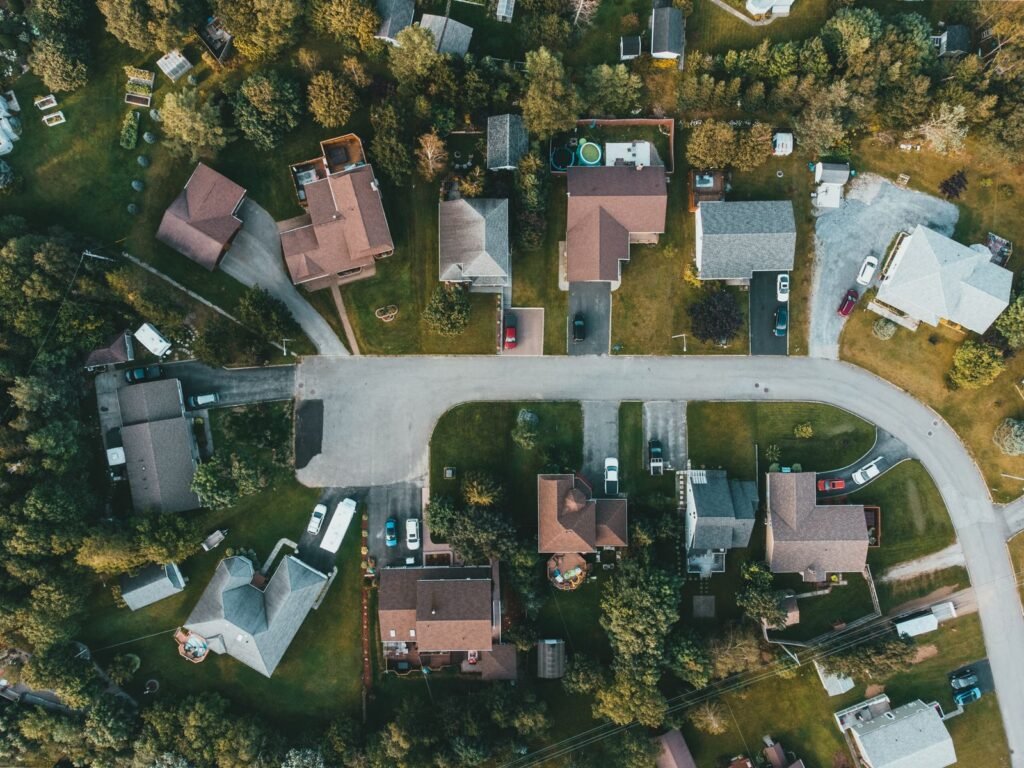 Aerial view of suburban homes with shingle roofs in Lomita, CA